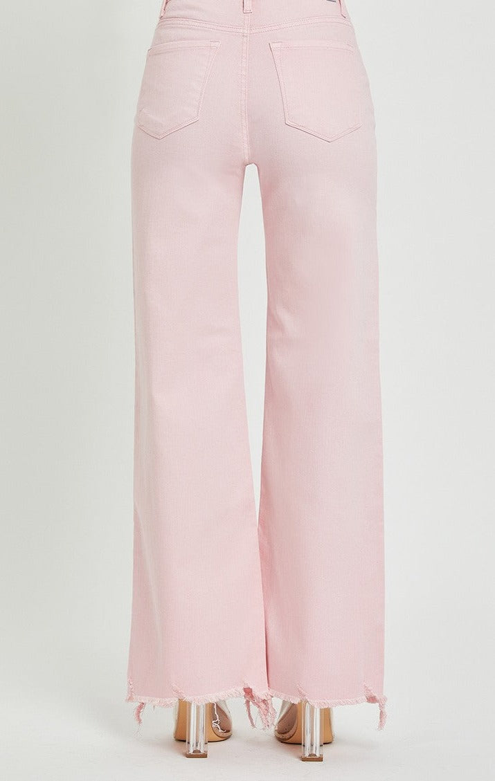 JEANS DE TIRO ALTO CON ROSA